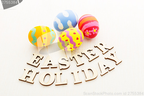 Image of Easter egg with wooden text