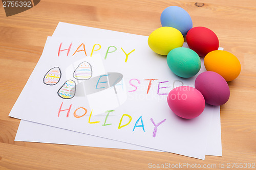 Image of Painted easter egg and kid drawing