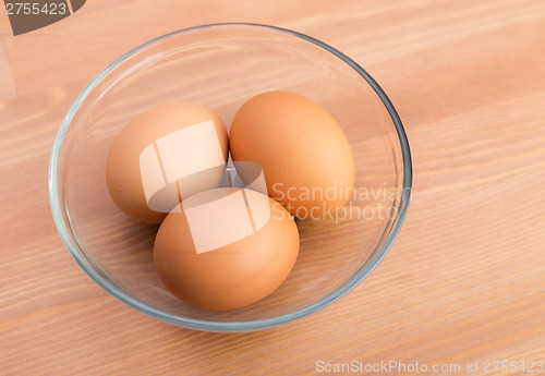 Image of Brown egg in bowl