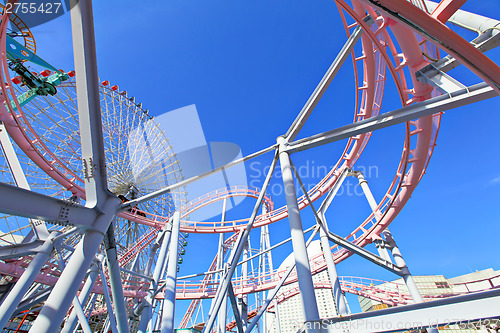 Image of Amusement park with clear blue sky