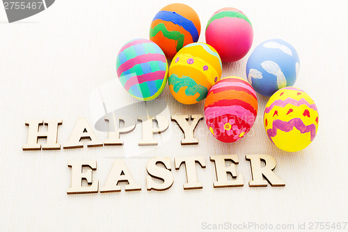 Image of Painted easter egg and wooden text