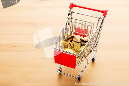 Image of Trolley with golden coin