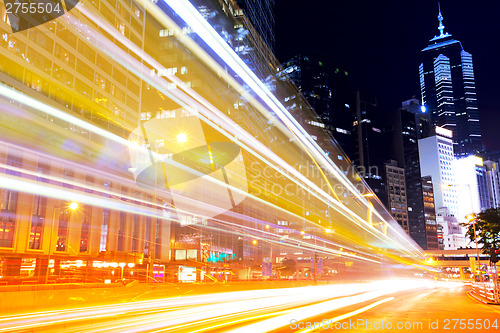 Image of Busy traffic in modern city at night