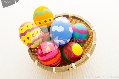 Image of Colourful pattern easter egg in basket