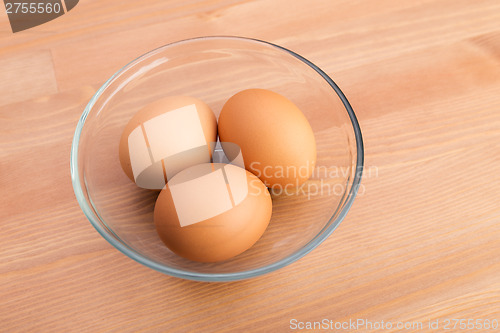 Image of Brown egg in bowl
