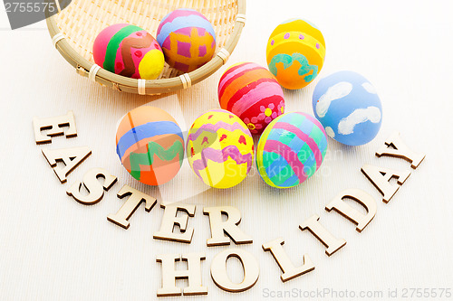 Image of Colourful design easter egg with wooden word