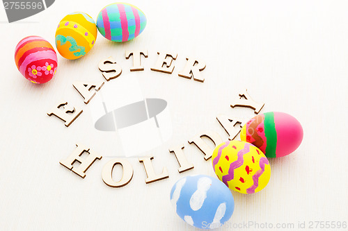 Image of Easter egg with wooden text 