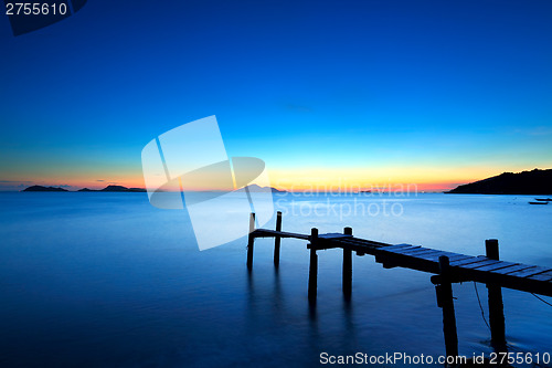 Image of Wooden jetty with seascape during sunet
