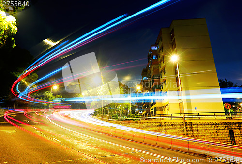 Image of Fast moving car light on road