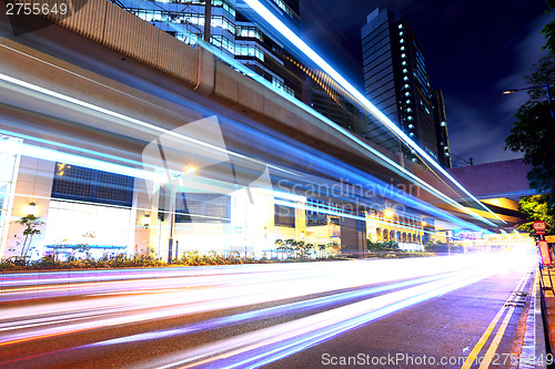 Image of Fast moving car light on road
