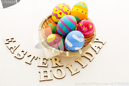 Image of Colourful design easter egg with wooden word