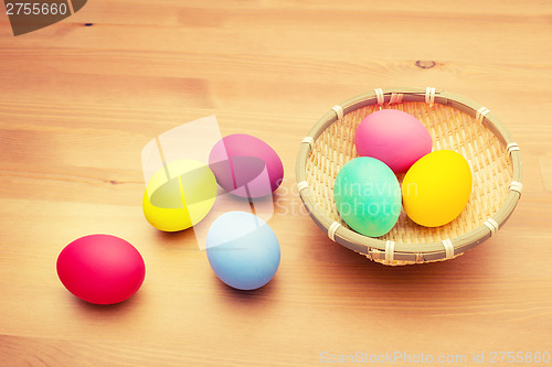 Image of Colourful painted easter egg and basket