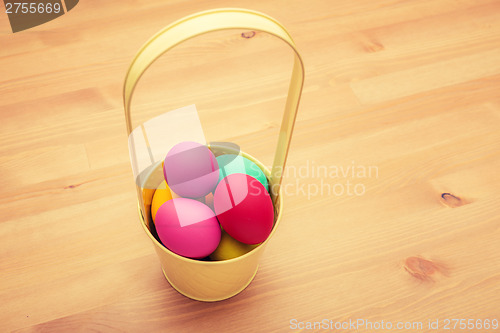 Image of Painted easter egg in bucket