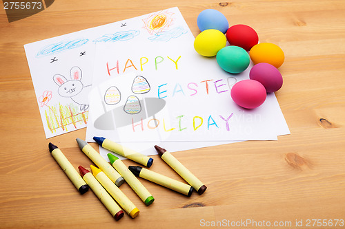Image of Kid drawing and egg for easter holiday