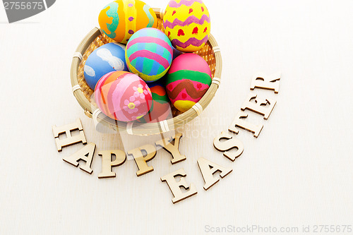Image of Colourful design easter egg with wooden word