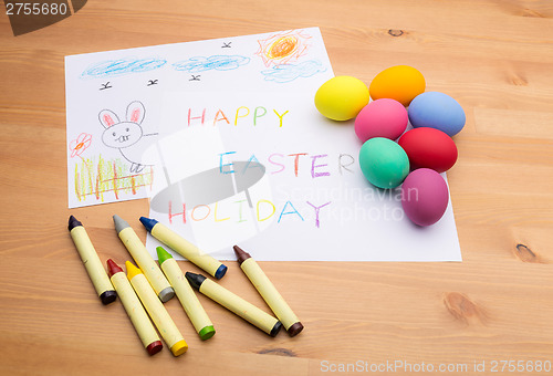 Image of Kid drawing for easter holiday