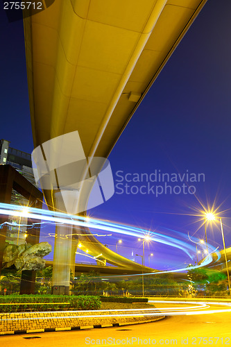 Image of Fast moving car light in city