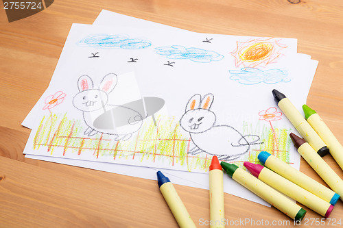 Image of Children hand drawing for easter holiday