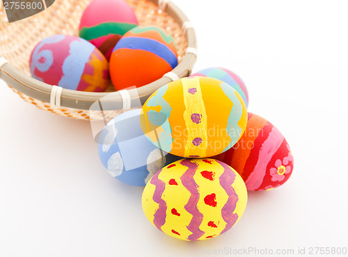 Image of Colourful easter egg in basket