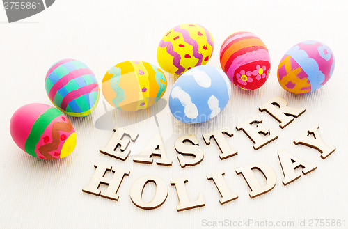 Image of Easter egg with wooden text