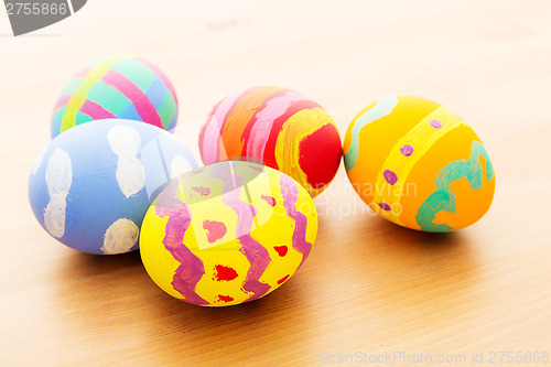 Image of Easter egg on wooden background
