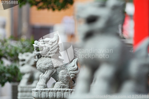 Image of Lion stone statue in chinese temple