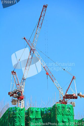 Image of Construction crane in site