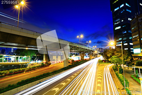 Image of Modern city with car light