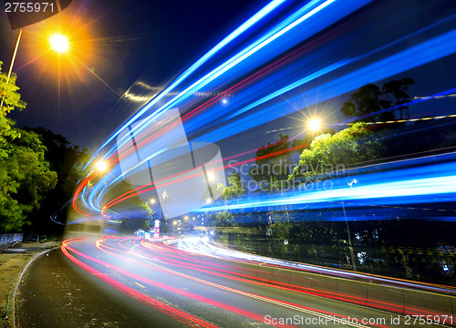 Image of Busy traffic on road at night