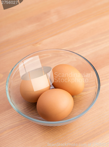 Image of Brown egg in bowl