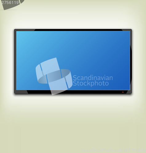Image of LCD or LED tv screen hanging on the wall