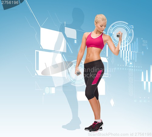 Image of young sporty woman with light dumbbells