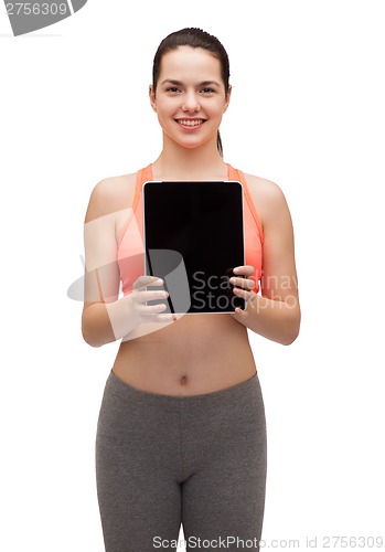 Image of sporty woman with tablet pc blank screen