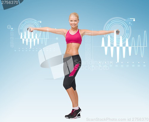 Image of young sporty woman with light dumbbells