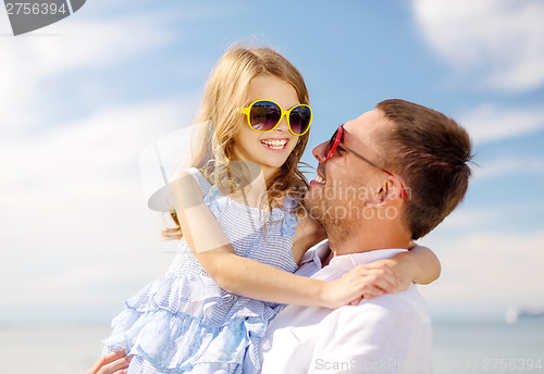 Image of happy father and child girl having fun outdoors