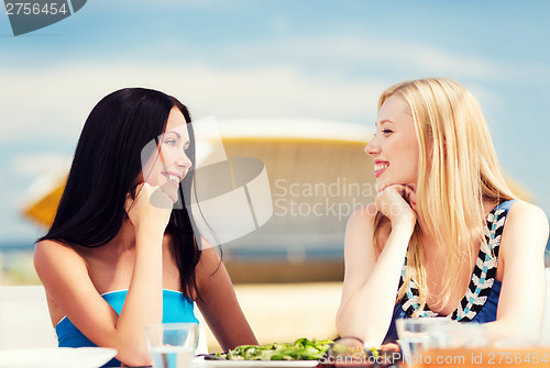 Image of girls in cafe on the beach