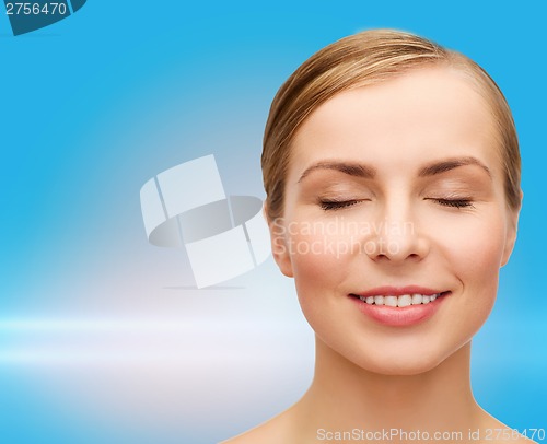 Image of face of beautiful woman with closed eyes