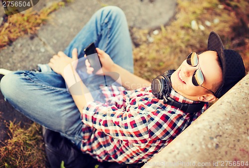 Image of girl with headphones and smartphone