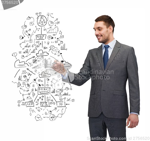 Image of attractive buisnessman or teacher with marker