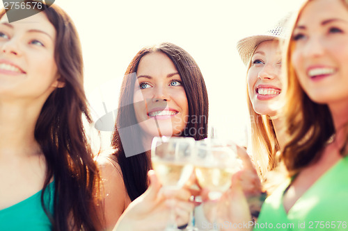 Image of girls with champagne glasses