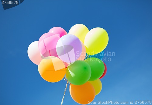 Image of lots of colorful balloons in the sky