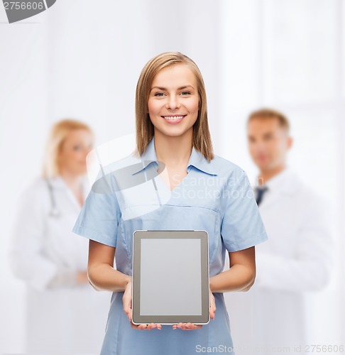 Image of smiling female doctor or nurse with tablet pc