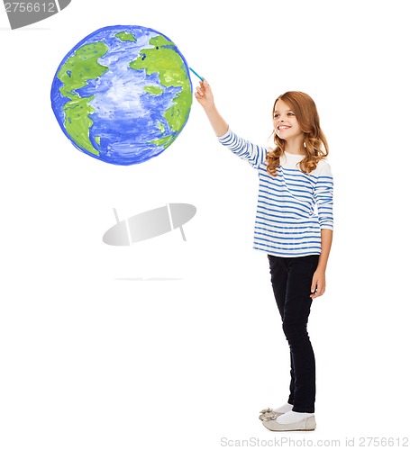 Image of girl drawing planet earth in the air