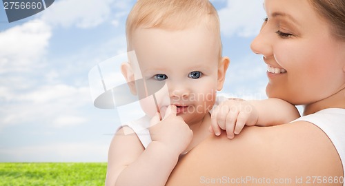 Image of happy mother with adorable baby