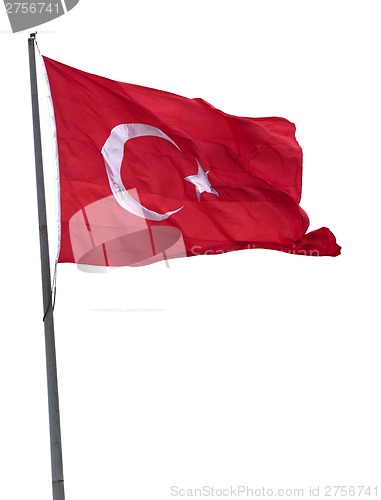 Image of Turkish flag on flagpole waving in wind