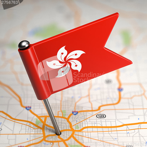 Image of Hong Kong Small Flag on a Map Background.