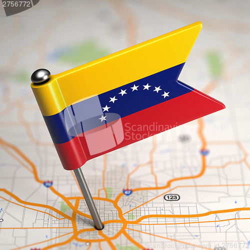 Image of Venezuela Small Flag on a Map Background.