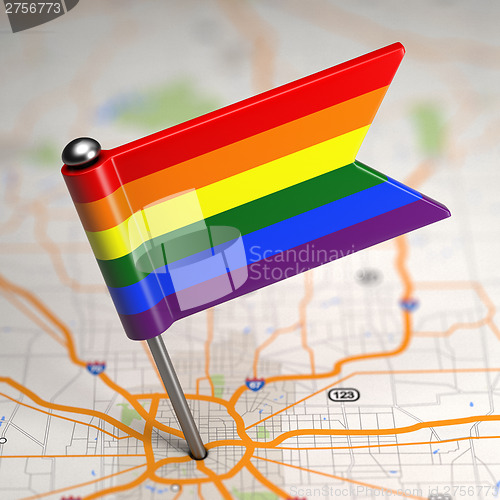 Image of Gay Small Flag on a Map Background.