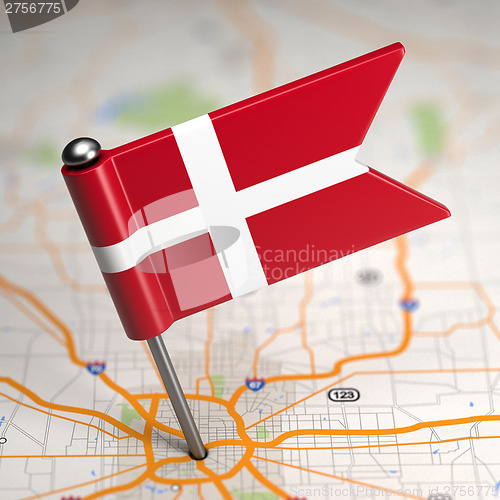 Image of Denmark Small Flag on a Map Background.