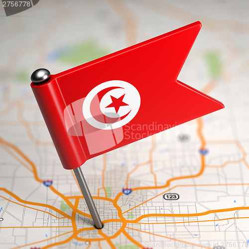 Image of Tunisia Small Flag on a Map Background.